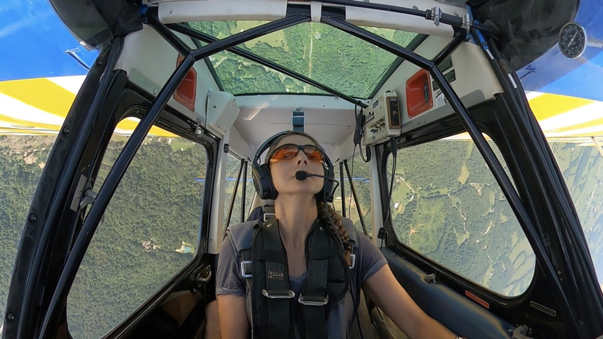 Celeny Da Silva flying a plane
