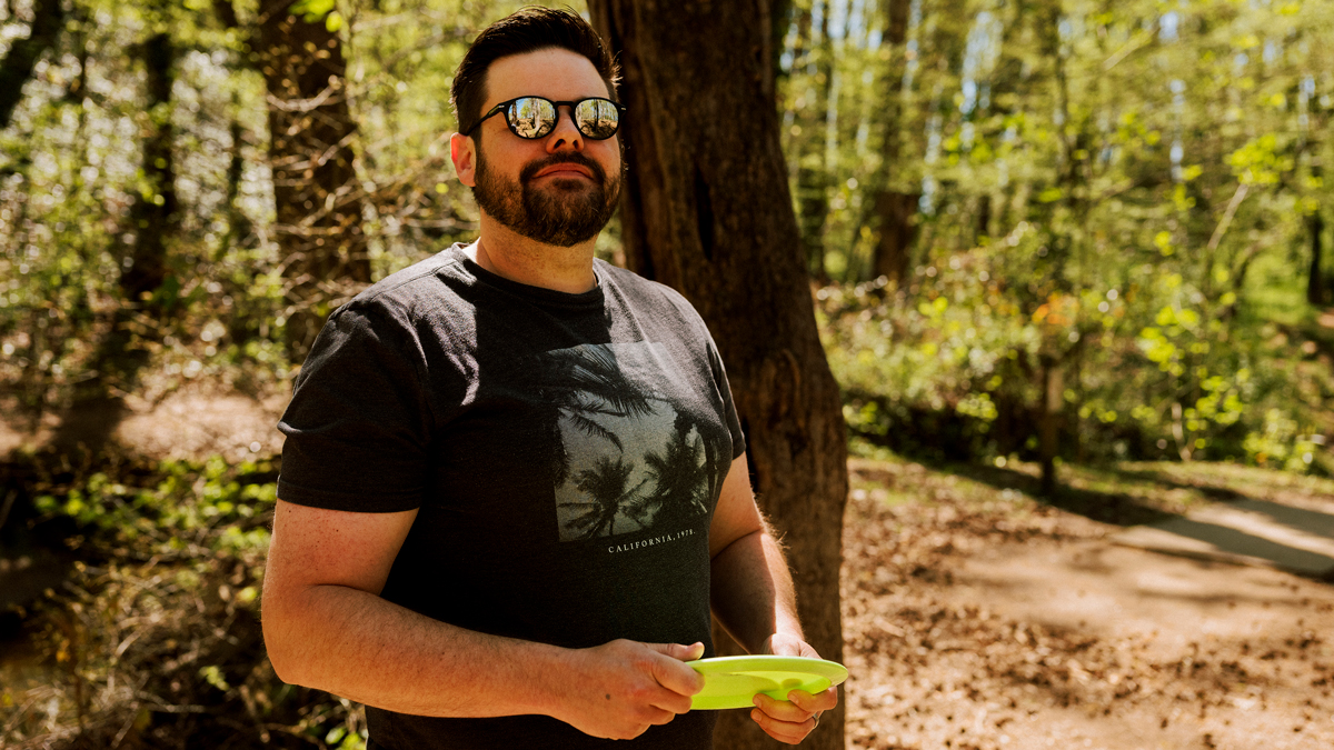 Chris Bradley playing disc golf