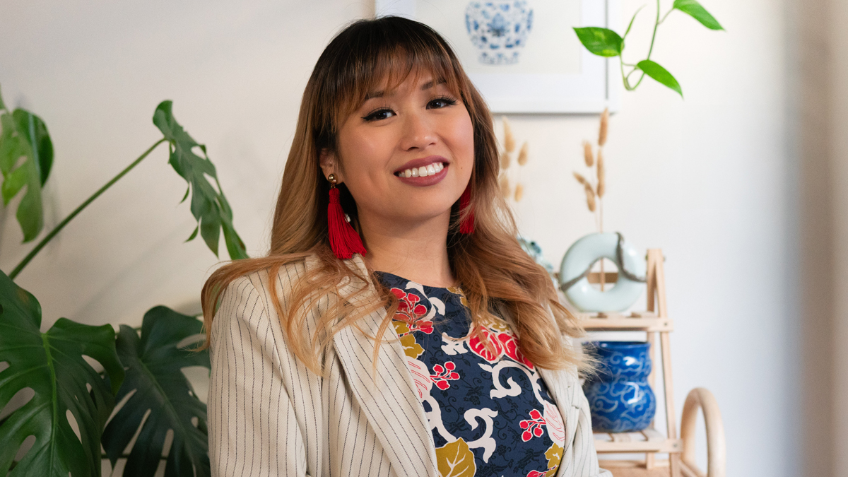 Josephine Zhu with pottery in the background