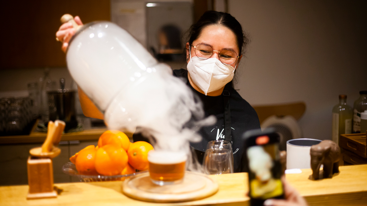Argelia Martinez making cocktails