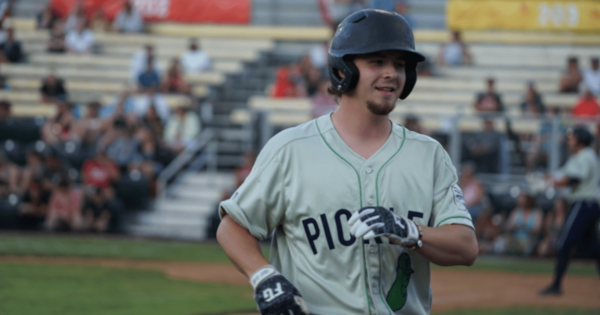 Portland Pickles general manager Parker Huffman playing baseball